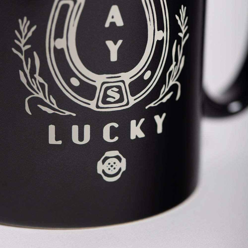 
                  
                    Laden Sie das Bild in den Galerie-Viewer, STAY LUCKY MUG - Black
                  
                